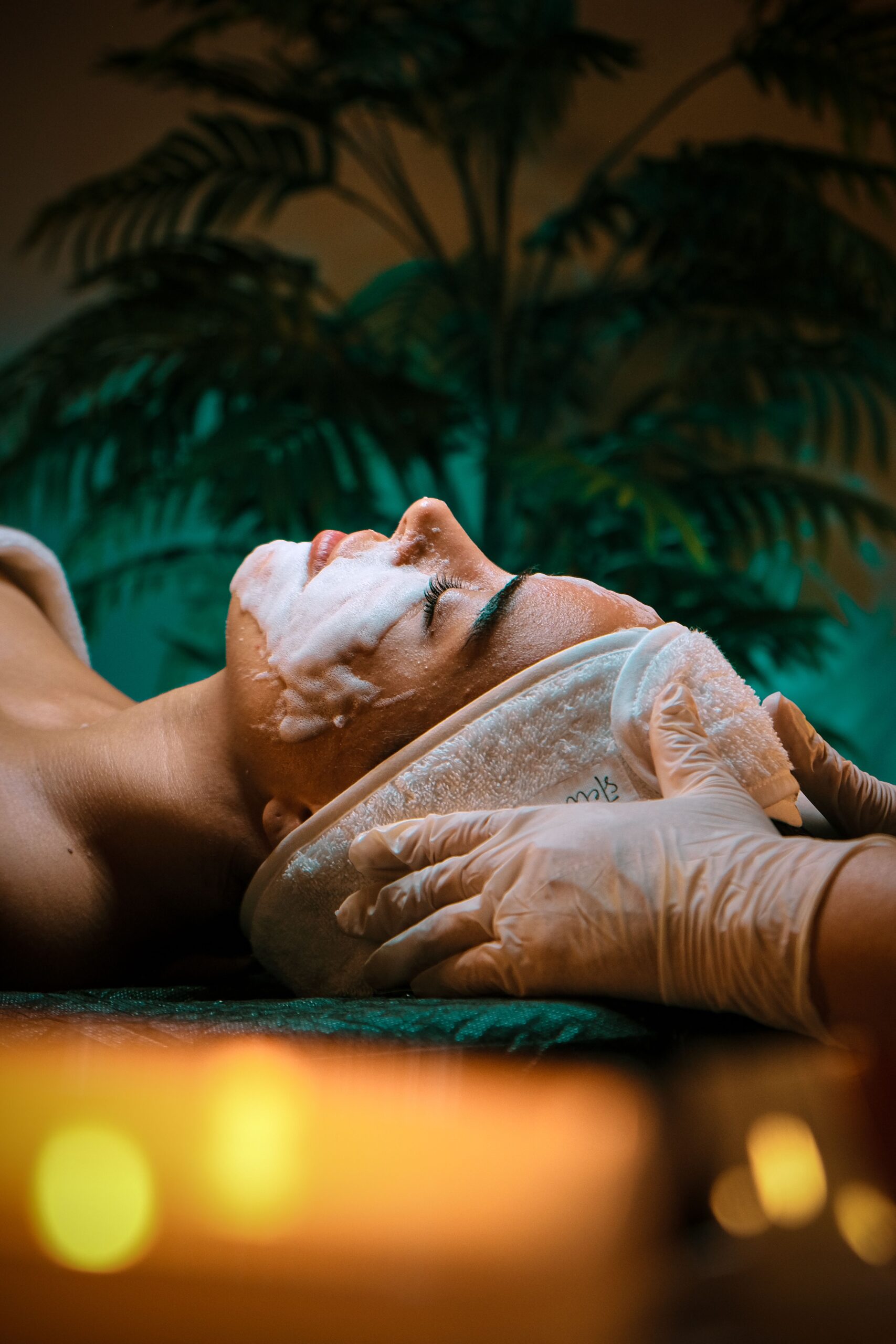 Client relaxing during a facial treatment at Skinversity Chicago